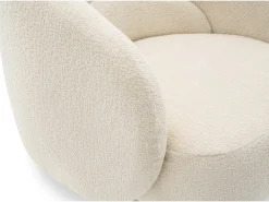 Fauteuil pivotant en tissu bouclette 